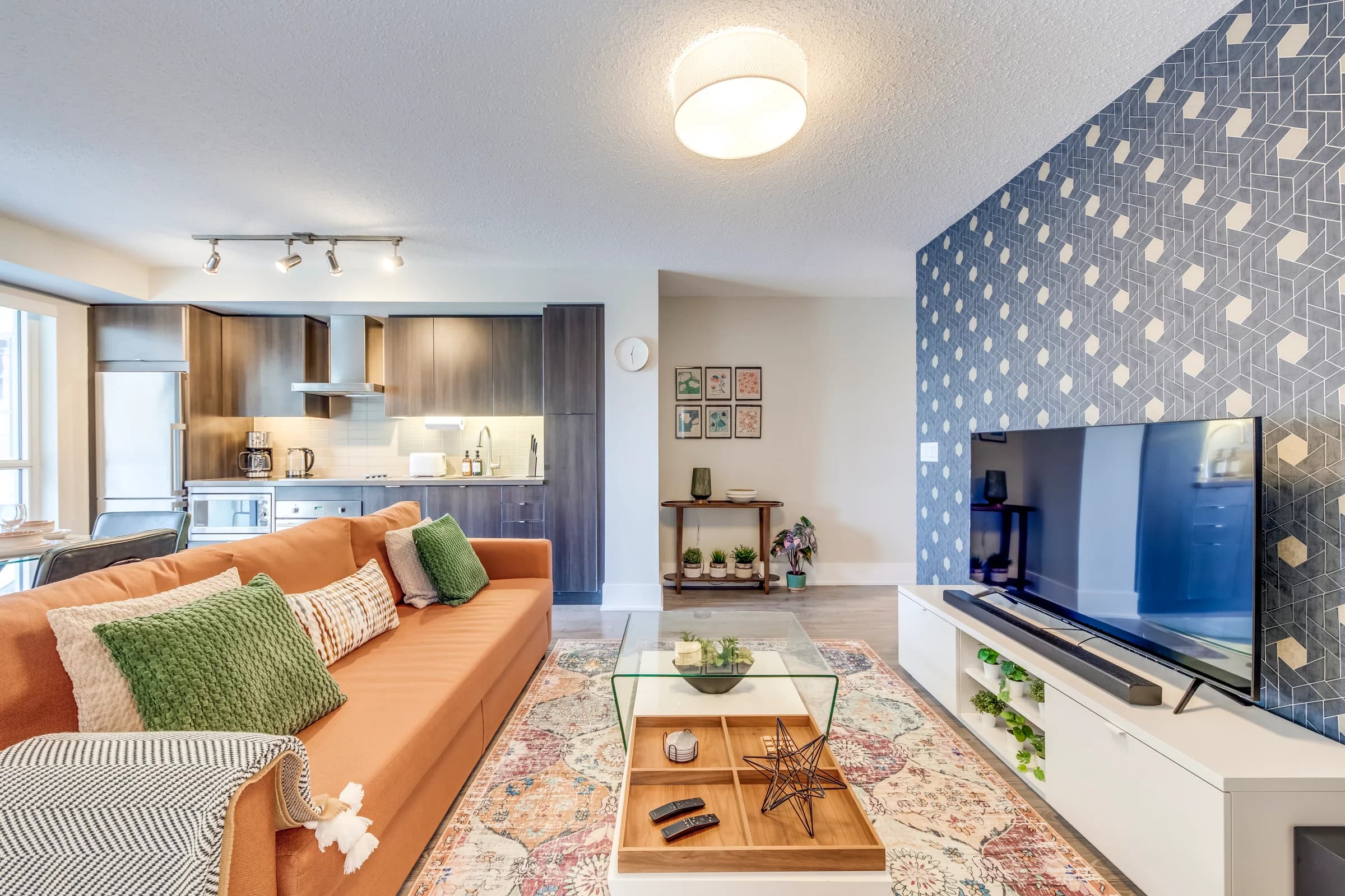 Sunlit open living space in a professionally furnished Toronto short-term rental managed by HSG