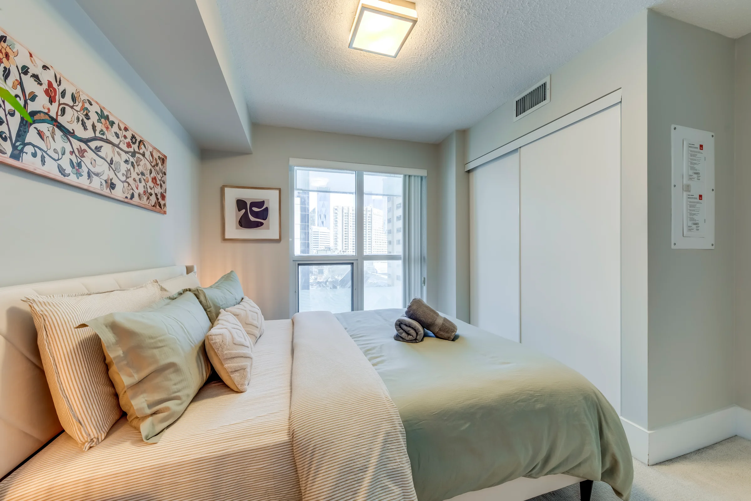 Spacious furnished living area in an HSG-managed executive rental in downtown Toronto
